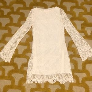 Stone Cold Fox white lace bell-sleeve dress.